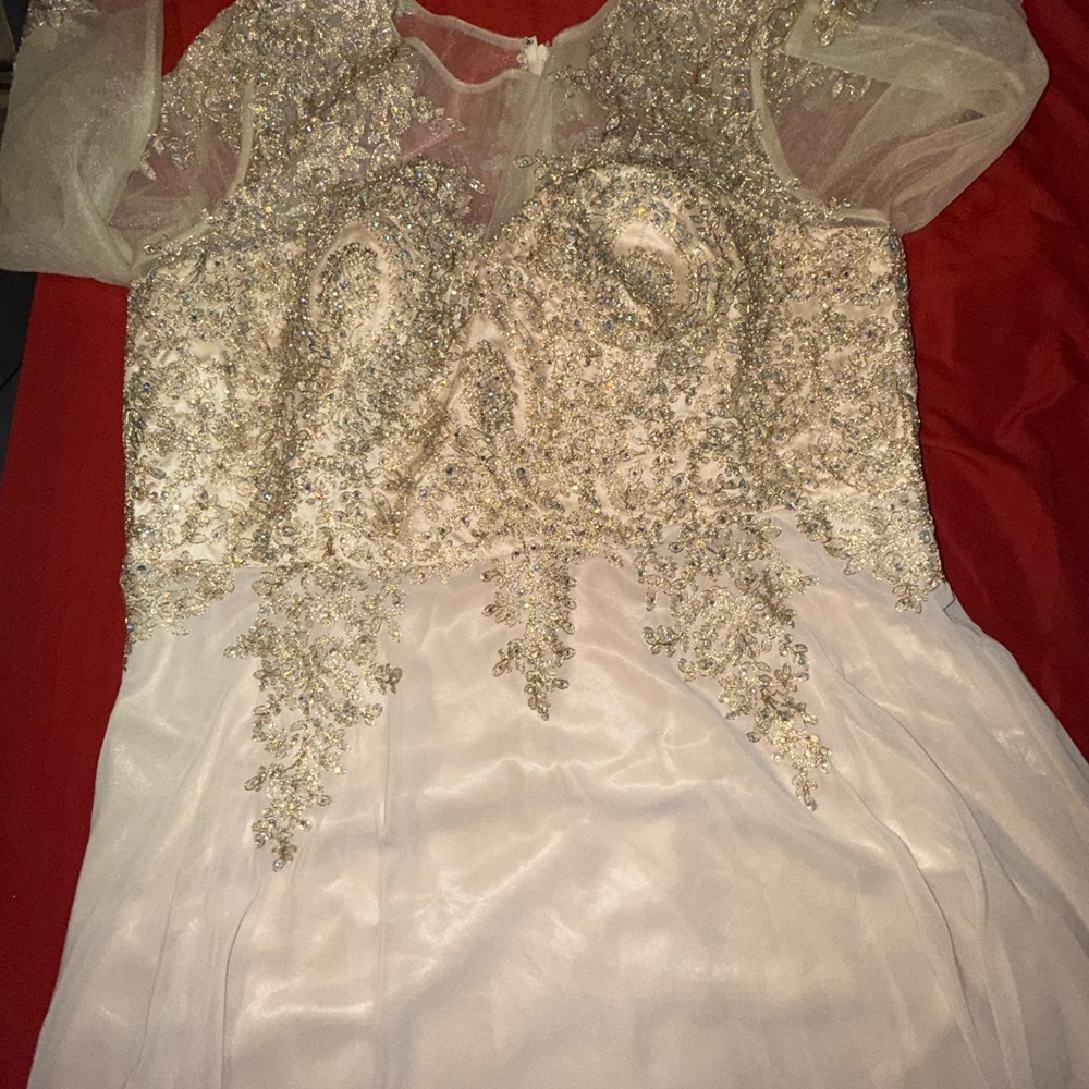 Elegant Beaded Gown with Sheer Sleeves